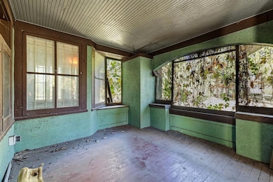 Screened-in portion of front porch
