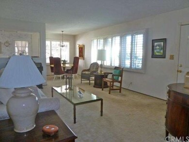 View from the family room into the living room.  O