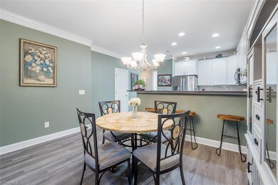 Breakfast area opens to kitchen and great room.