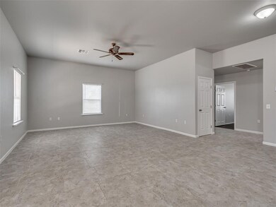 Unfurnished room with ceiling fan