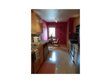 Kitchen. Galley style kitchen with stainless steel