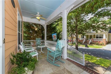 Tiled porch with nice view of tree-lined street