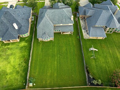 Enjoy an aerial view of the 3,965 sq.ft home and >1/4 acre lot, with the added peace and privacy of no back neighbors.