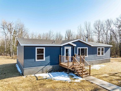 View of front of house featuring a front yard and 