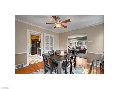 Spacious dining room with built-in china cabinet.