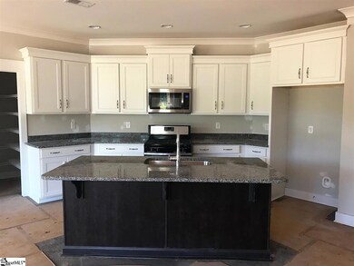 Kitchen with walk in pantry and stainless steel ap