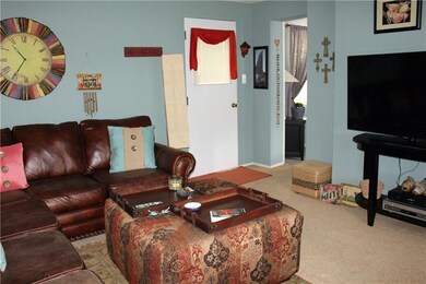 Large Family Room with access to outside deck.