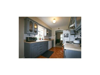 Kitchen has lots of cabinets