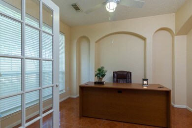 This very spacious room off the entrance could be use as your office or your formal dining room.