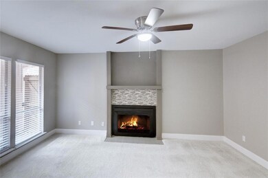 LIVING ROOM WITH WOOD BURNING FIREPLACE
