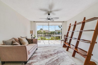 Large and spacious living room with sliders to bac