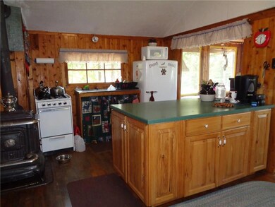 Kitchen with gas range and...