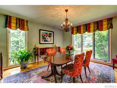Dining Room with windows on the front and side of 