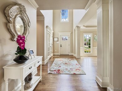 Foyer ~ study with french doors and dining room on