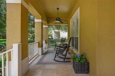Charming front porch complete with ceiling fan on 