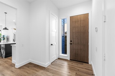 Another small detail such as the coat closet located on your left hand side as you soft white walls gives this home a light and bright feel.