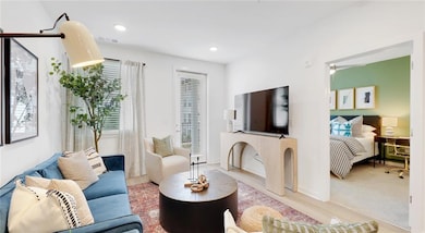 Living room with light wood-type flooring