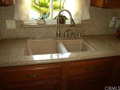 Under mount kitchen sink.