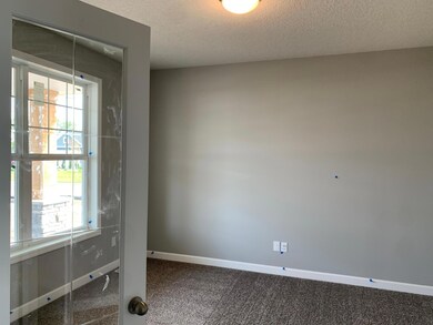 The flex room is a great place for an office for those who like to stay organized, play area for the kids, or just a place to sit down and read that book you've been meaning to read.(Model photo)