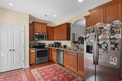 Kitchen with appliances with stainless steel finis