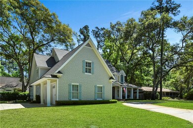 Front of home showing garage and side entrance