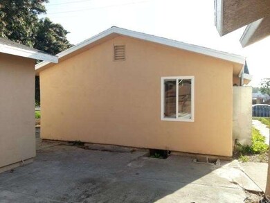 BACK OF FRONT HOUSE
