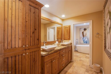 custom master bath room is very appealing- cabinet