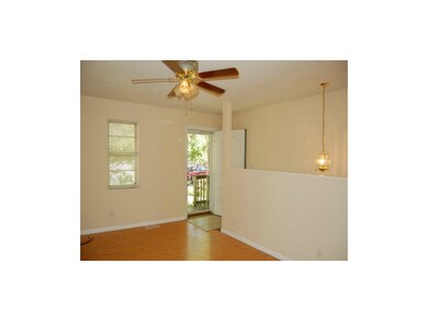 Front door and stairs to walkout lower level from 