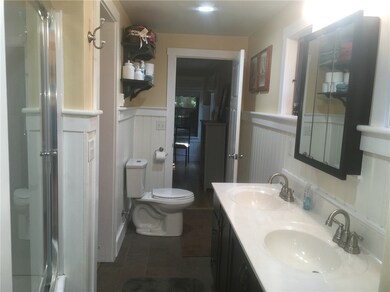 First floor full bathroom. Double sink vanity with