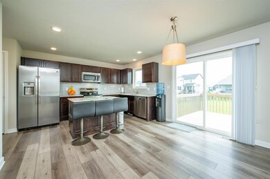 Kitchen and dining area with access to the backyar