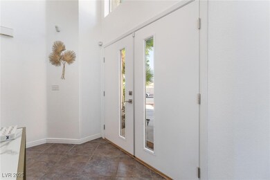 Foyer with baseboards