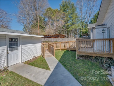 Sidewalk and ramp to home from detached 2 car garage
