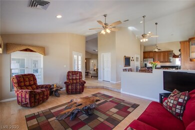 Large separate family room with vaulted ceilings.