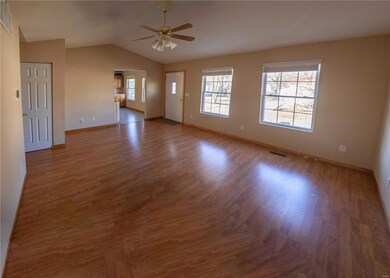 Enter into this living room, new flooring installed May of this year!