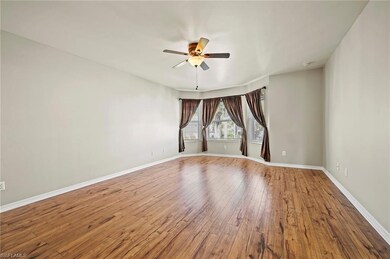 Unfurnished Primary bedroom featuring hardwood / w