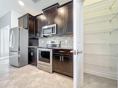 10182 Authors Way, Orlando, FL 32832 - photo 6