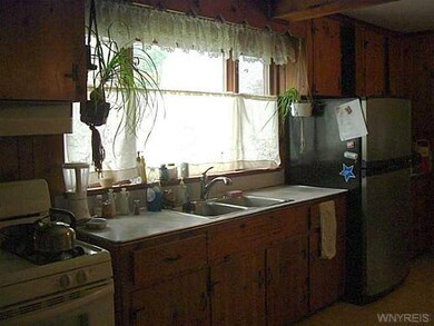 Kitchen. LG. EAT-IN KITCHEN W/KNOTTY PINE CUPBOARD