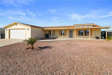 Ranch-style home featuring driveway, an attached g