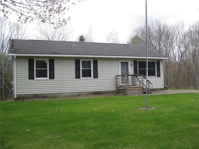 Front lawn with flagpole.