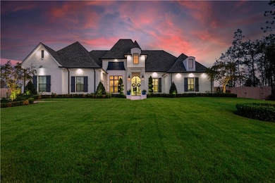 Twilight view of the property with strategically p