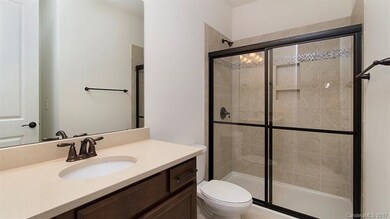 First floor full bath with walk in shower and quar