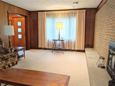 23 f. living room with wood burning fireplace