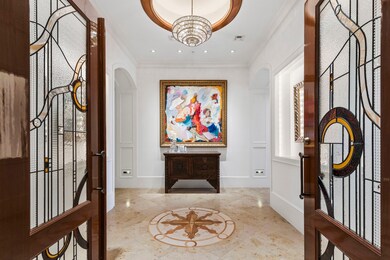 Beautiful double leaded glass door entry into the