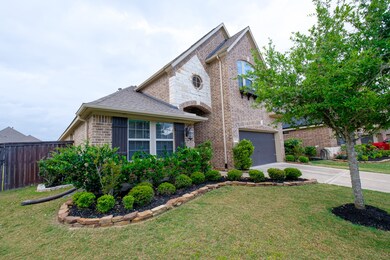 Freshly cut shrubs, lively oak tree, and stone tri