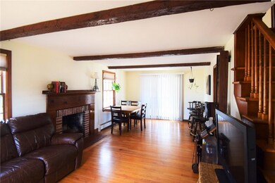 Living room with brick fireplace