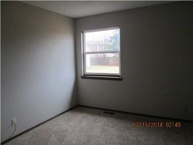 2nd bedroom with new paint and carpet