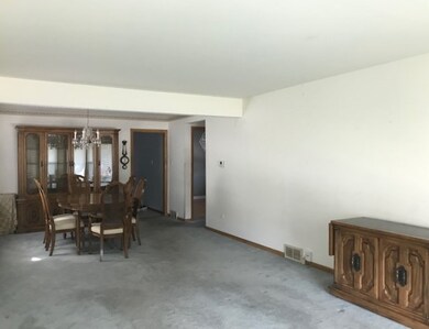 Hardwood Floor under carpeting.  Chandelier exclud