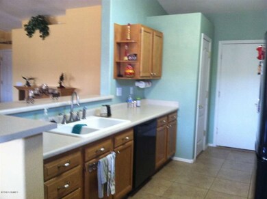 KITCHEN LOOKING INTO GREAT ROOM