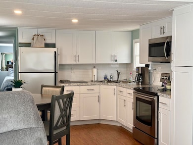 285 N Orchard Island Rd unit lot 66, Russells Point, OH 43348 - photo 6