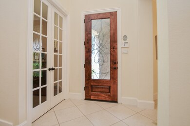 Beautiful glass/wood door with ornamental wrought